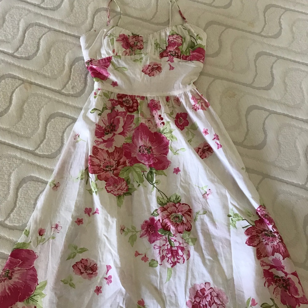 White and floral dress.